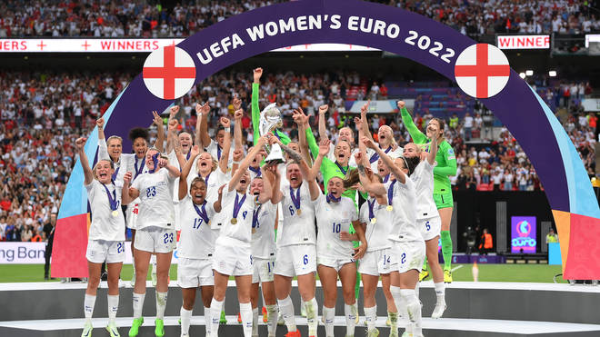 Leah Williamson and Millie Bright of England lift the UEFA Women’s EURO 2022 trophy