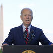 President Joe Biden speaks from the Blue Room Balcony of the White House