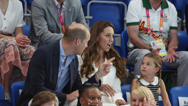 The duke and duchess were both pictured explaining things to their daughter