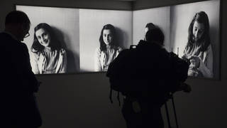 Journalists take images at the Anne Frank House museum in Amsterdam, Netherlands