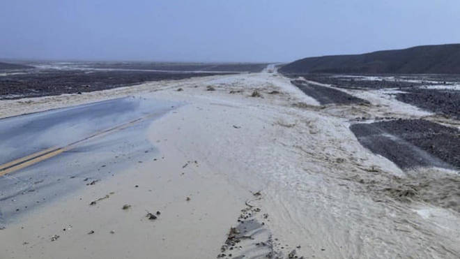 Highway 190 is closed due to flash flooding in Death Valley National Park, California