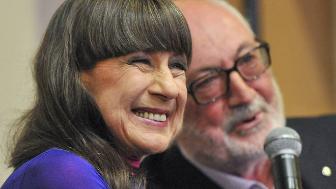 Seekers lead singer Judith Durham with fellow band member and guitarist Athol Guy at a media conference in Melbourne, Australia, in 2013