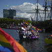 Boats line up for the start as thousands of people lined canals in the Dutch capital to watch the colourful spectacle of the Pride Canal Parade in Amsterdam, Netherlands