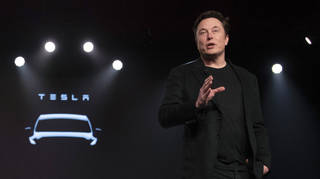 Tesla CEO Elon Musk speaks before unveiling the Model Y at the company’s design studio in 2019