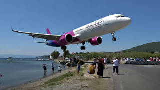 The 'lowest ever landing' Astonishing footage show's plane landing at greek island airport