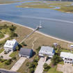 Aerial view of Garden City Beach in South Carolina with Murrells Inlet in background.