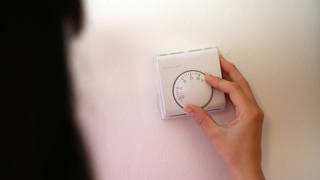 A central heating thermostat