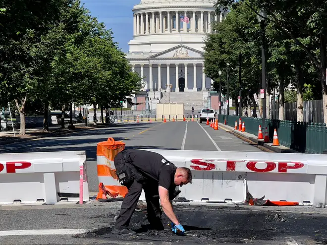 A man died early Sunday near the US Capitol building after driving his car into a barricade and firing shots into the air before turning his gun on himself, police said