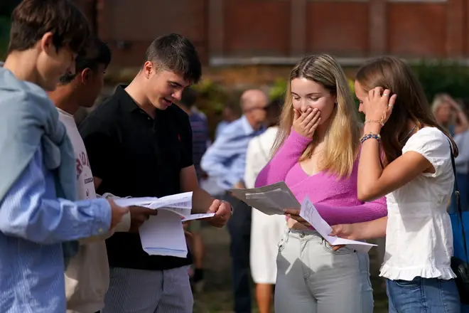 Students reading their results at Norwich School