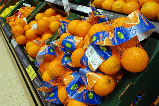 Tesco's oranges are coated in beeswax containing shellac, a resin secreted by insects