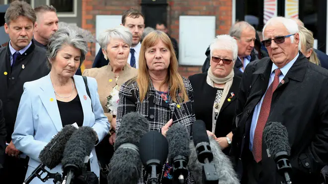 Margaret Aspinall (centre) speaks to the media outside Parr Hall, Warrington, where the CPS said Hillsborough match commander David Duckenfield had been charged with offences relating to the Hillsborough disaster Photo: PA