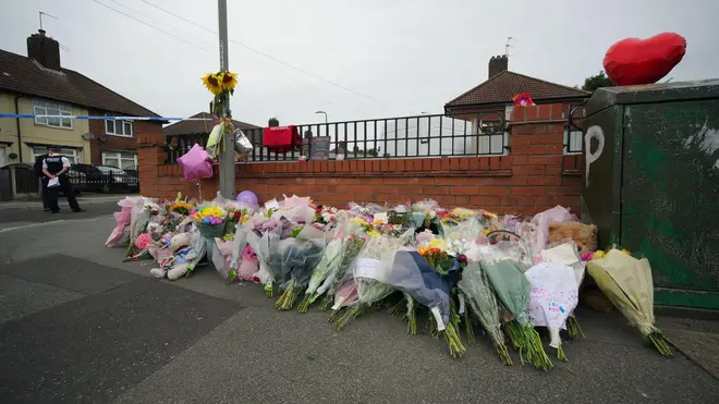 A sea of floral tributes near the scene where Olivia was killed