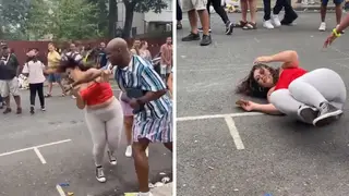 The footage shows the woman being punched in the face before hitting the ground.