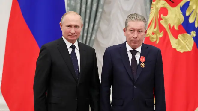 Putin and Mr Maganov pose for a photo during an awarding ceremony at the Kremlin in Moscow on November 21, 2019