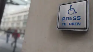 A wheelchair access button