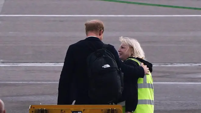 Prince Harry embraced an airport worker before flying home