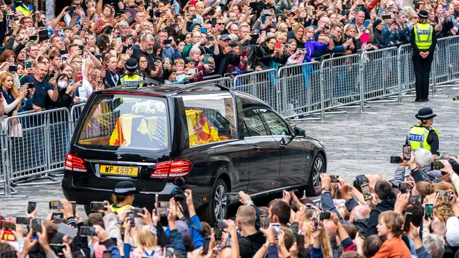 The Queen's coffin arrives at the Palace of Holyroodhouse in Edinburgh