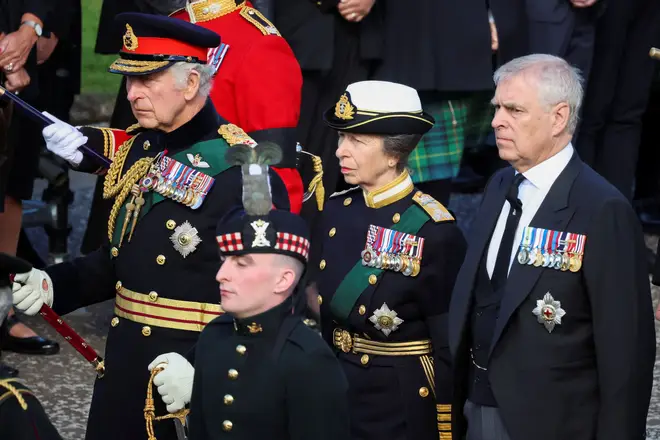 King Charles III, Princess Anne and Prince Andrew following a hearse carrying Queen Elizabeth II's coffin in Edinburgh before it is laid to rest at St Giles' Cathedral