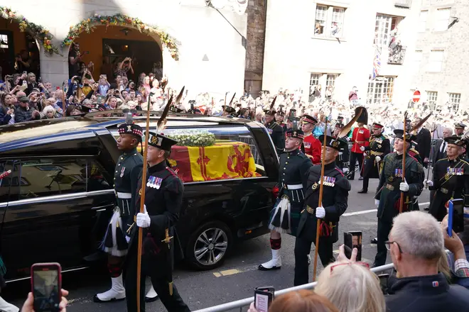 The Queen's cortege travelling from the Palace of Holyroodhouse to St Giles' Cathedral on Monday