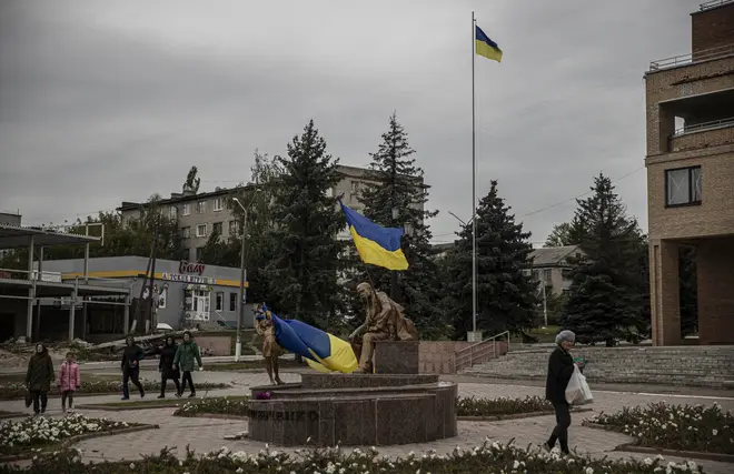 Ukrainian flags wave after the army liberated the town of Balakliya in the southeastern Kharkiv oblast