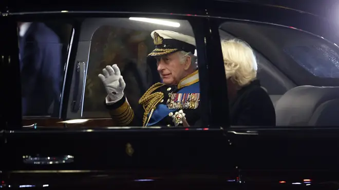 The King and Queen Consort leaving Westminster Hall