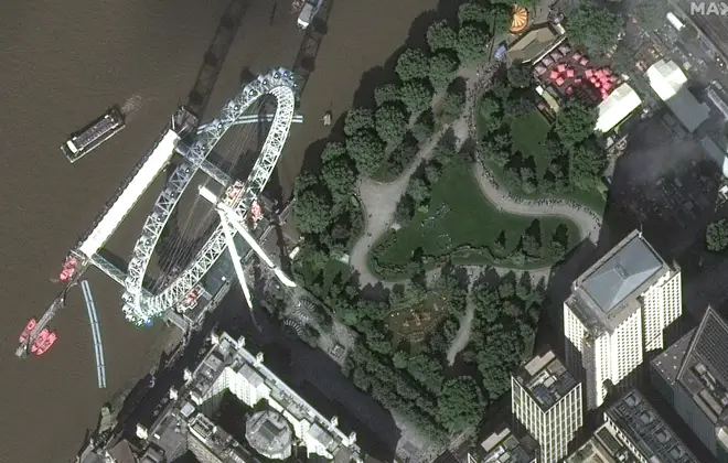 The satellite images show the scale of the queue to see the Queen