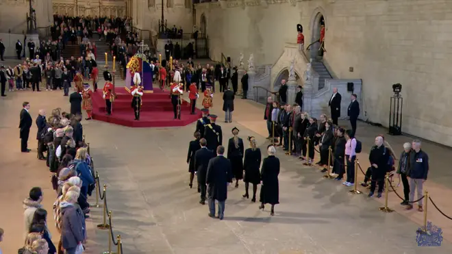 The Queen's grandchildren file into Westminster Hall to stand guard over her coffin