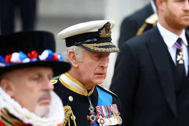 Charles appeared to wipe away a tear as the coffin entered Westminster Abbey