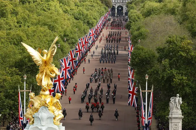 Tens of thousands of people lined the streets to see the Queen's coffin