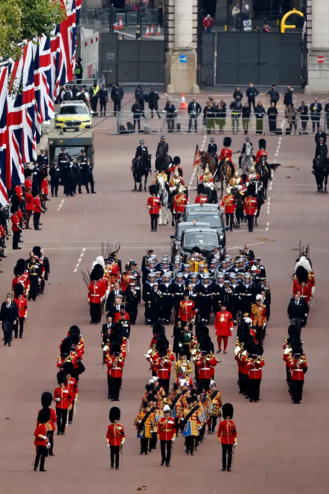 The Queen's coffin makes its way down the Mall for the final time