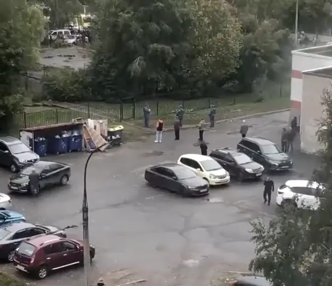 Police at the scene of the shooting in Izhevsk, central Russia