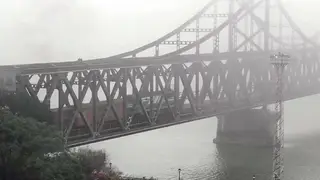 A freight train crosses a bridge connecting China and North Korea in Dandong in north-eastern China’s Liaoning province