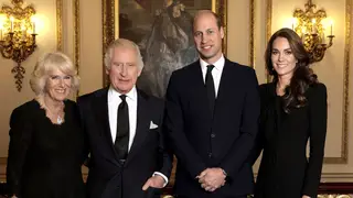 A smiling family portrait of the King, his son who is the first in line to the throne and their wives.