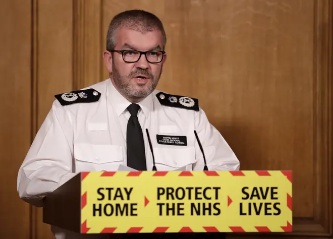 Martin Hewitt, the chairman of the National Police Chiefs' Council, speaking at a media conference during the pandemic