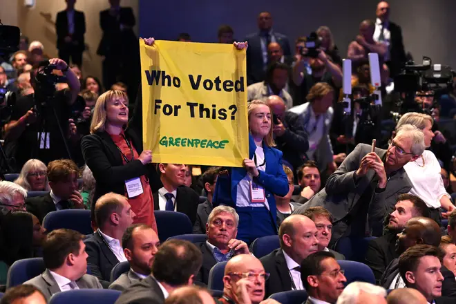 The prime ministers speech was interrupted by protestors from Greenpeace.