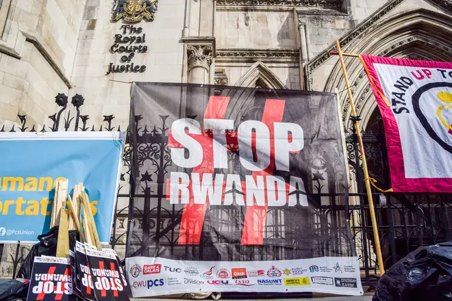 "Stop Rwanda" banner is seen during the demonstration...