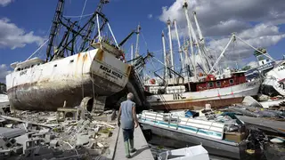 smashed boats following hurricane