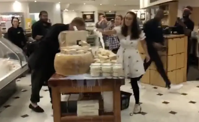 Protesters poured milk over a display in Selfridges