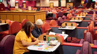 Customers enjoy a game at the Mecca Bingo hall in Birmingham