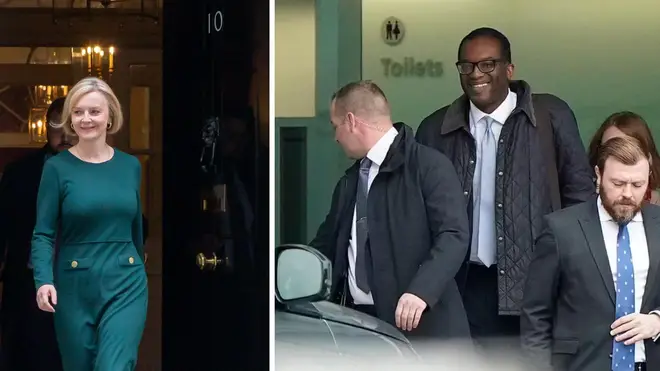 Liz Truss has sacked Chancellor Kwasi Kwarteng (seen smiling as he arrives back at Heathrow today)