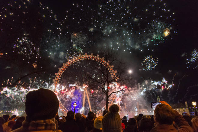 Crowds gather near the London Eye to watch the display