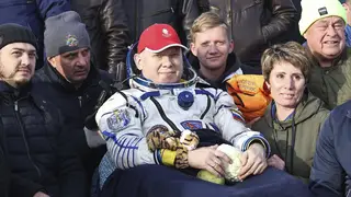Russian cosmonaut Oleg Artemyev sits in the chair shortly after the landing of the Russian Soyuz MS-21 space capsule south-east of the Kazakh town of Zhezkazgan, Kazakhstan, on Thursday September 29 2022