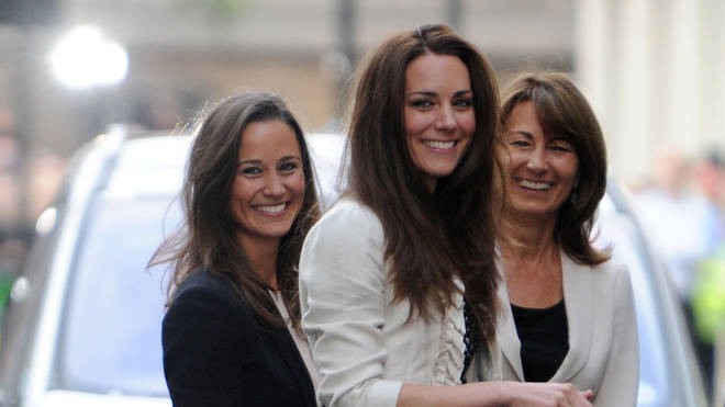 Kate with her mother and sister, Pippa, in 2011