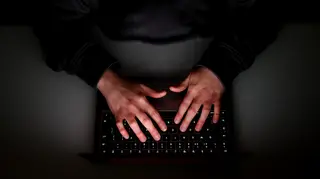A file image of somebody using a laptop