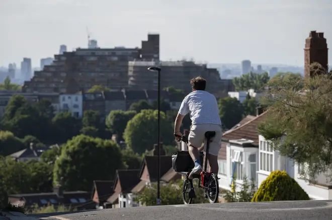 A cyclist approaching the Dawson's Heights development in Dulwich, south London.The ULEZ was expanded much further in north and south London last year