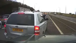 Driver holds his own one-man roadblock on the M62