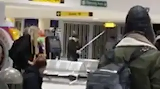 Men hit each other with metal poles in mass brawl at Belfast International Airport