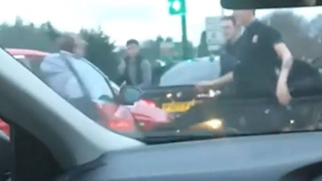The shocking road rage attack was filmed by a nearby motorist