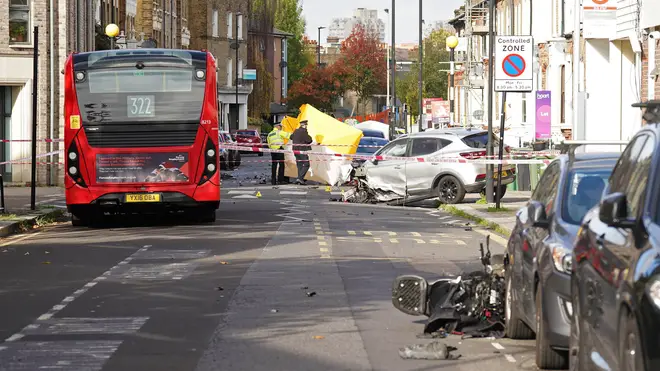 The aftermath of the shooting left a ruined car and a bike crashed near parked vehicles