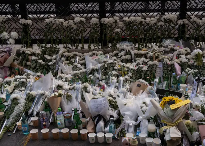 Floral tributes left to the victims of the crush in Seoul